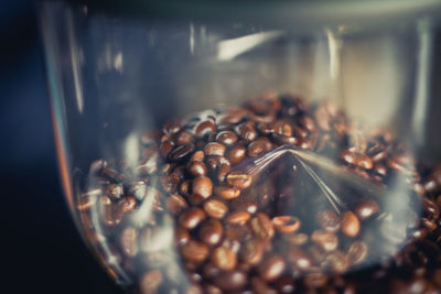 Close-up of coffee beans in glass
