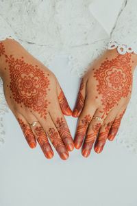 Hands with henna tattoo