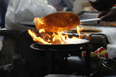 Close-up of meat cooking on barbecue grill