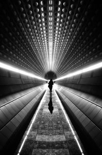 People walking in tunnel