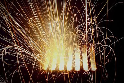 Close-up of firework display at night