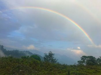 Scenic view of rainbow against sky