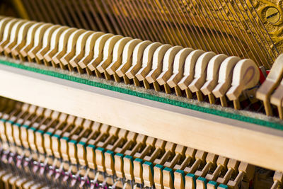 Piano instrument inside, antiquary piano and old mechanism, close-up