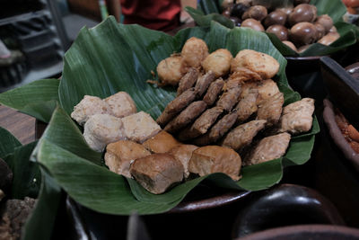 High angle view of vegetables on leaves at market