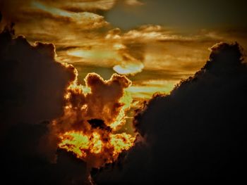 Scenic view of cloudy sky at sunset