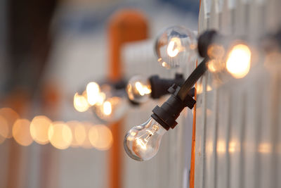 Close-up of illuminated light bulb