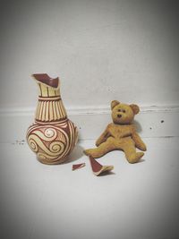 Close-up of stuffed toy on table at home