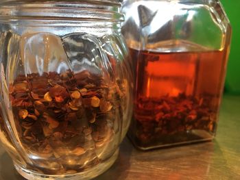 Close-up of drink in glass jar on table