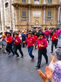 People walking on street in city