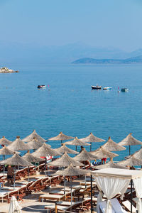 Scenic view of sea against clear blue sky