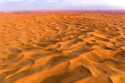 Scenic view of desert against sky