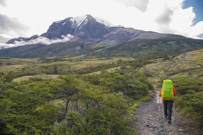 Female hiker on the way up to torres del paine national park patagonia