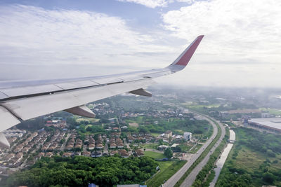 Aerial view of cityscape against sky