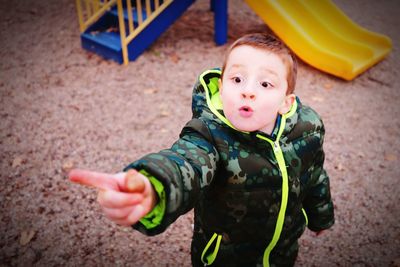 Cute boy playing outdoors