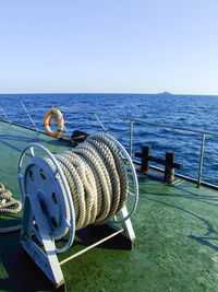 Nautical vessel on sea against clear sky