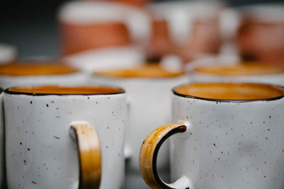 Close-up of coffee cup on table