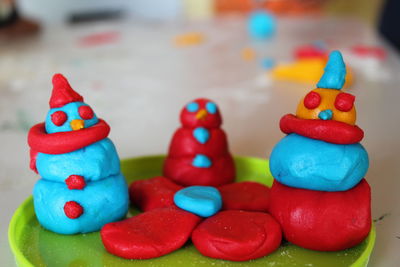 Close-up of multi colored candies on table