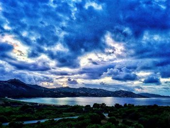 Scenic view of sea against dramatic sky