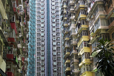 Low angle view of buildings in city, hongkong