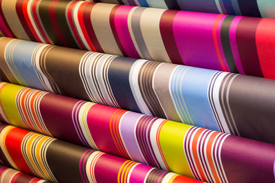 Close-up of colorful fabrics for sale in store