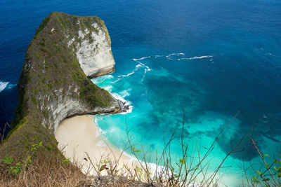 High angle view of rock formation in sea