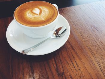 High angle view of cappuccino on table