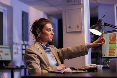 Female doctor working in office