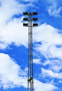 Low angle view of communications tower against sky