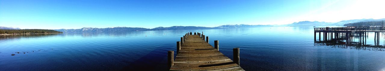 Panoramic view of pier on lake tahoe against sky