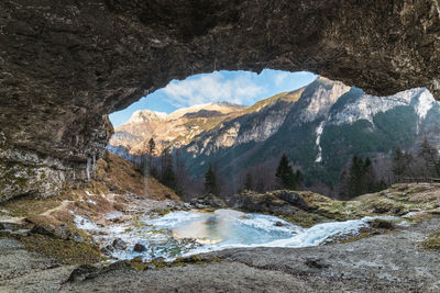 Winter. ice games in the fontanon of goriuda waterfall. friuli, italy.