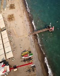 High angle view of deck chairs on beach