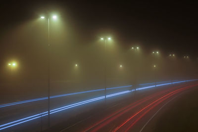 Light trails on road at night