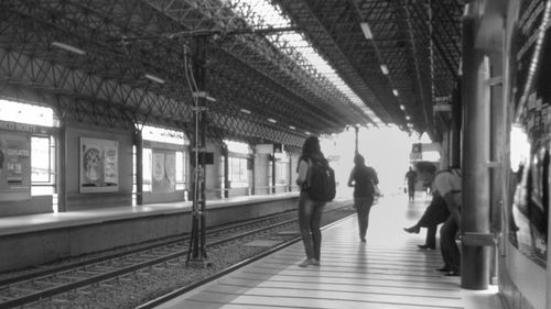 People at railroad station