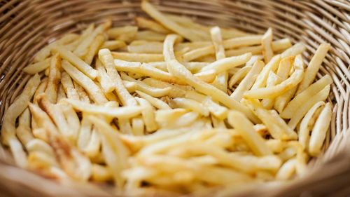 Close-up of french fries in basket