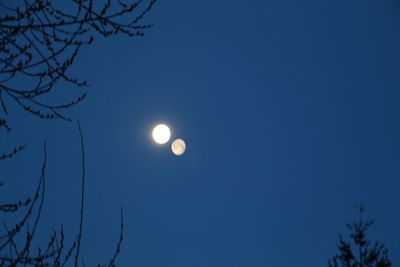 Low angle view of moon in sky