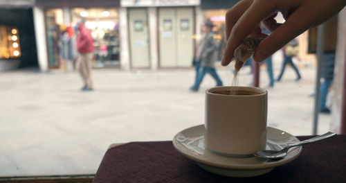 Coffee cup on table at cafe