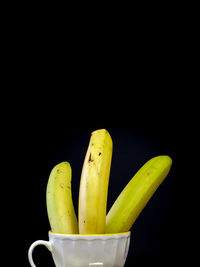 Close-up of fruit against black background