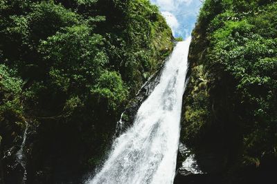 Low angle view of waterfall