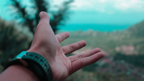 Close-up of person hand holding hands