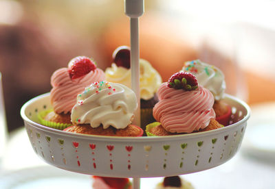 Close-up of cupcakes in cakestand