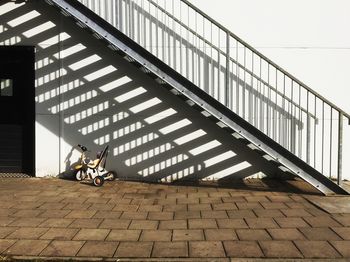 Man sitting on bridge