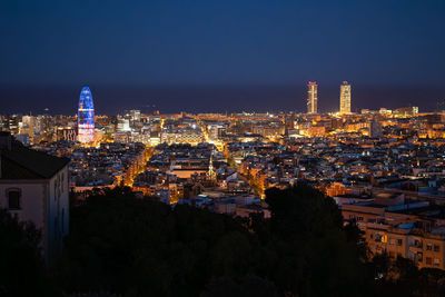 Illuminated buildings in city