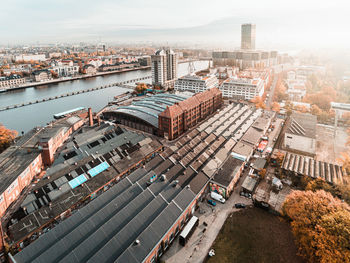 Aerial view of city against sky