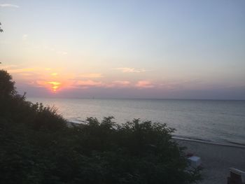 Scenic view of sea at sunset