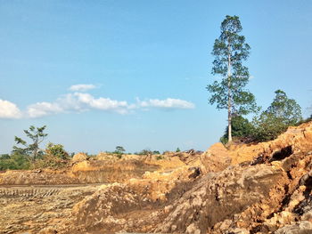 Scenic view of rocky landscape against sky