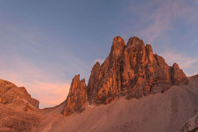 Scenic view of rocky mountains against sky