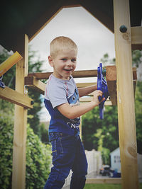 Full length of boy playing outdoors