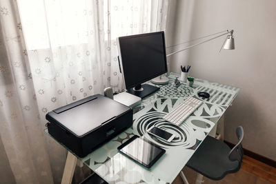 Electric lamp on table at home