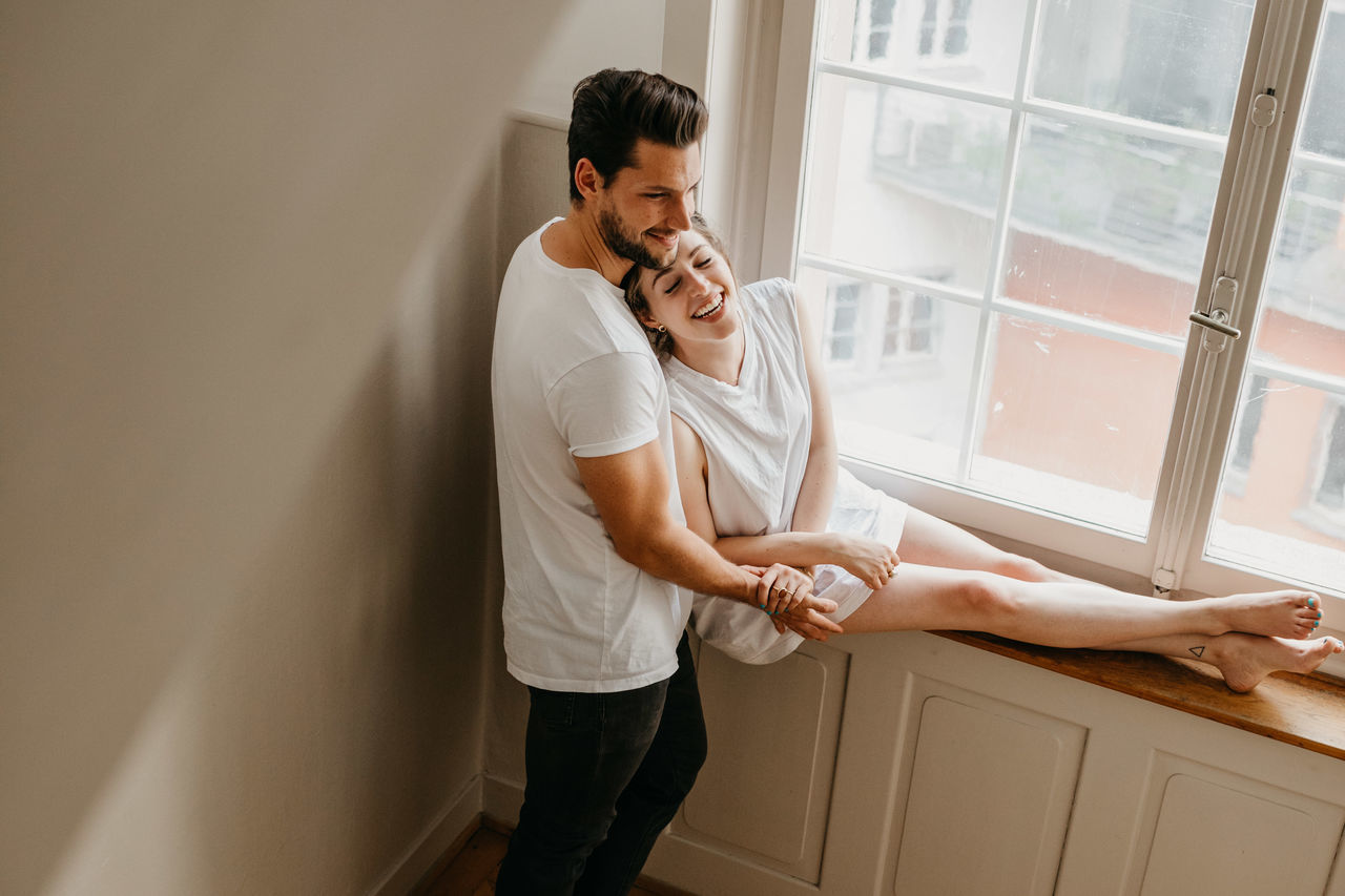 YOUNG COUPLE AT HOME