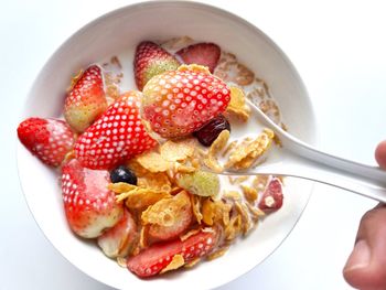 High angle view of strawberries in plate